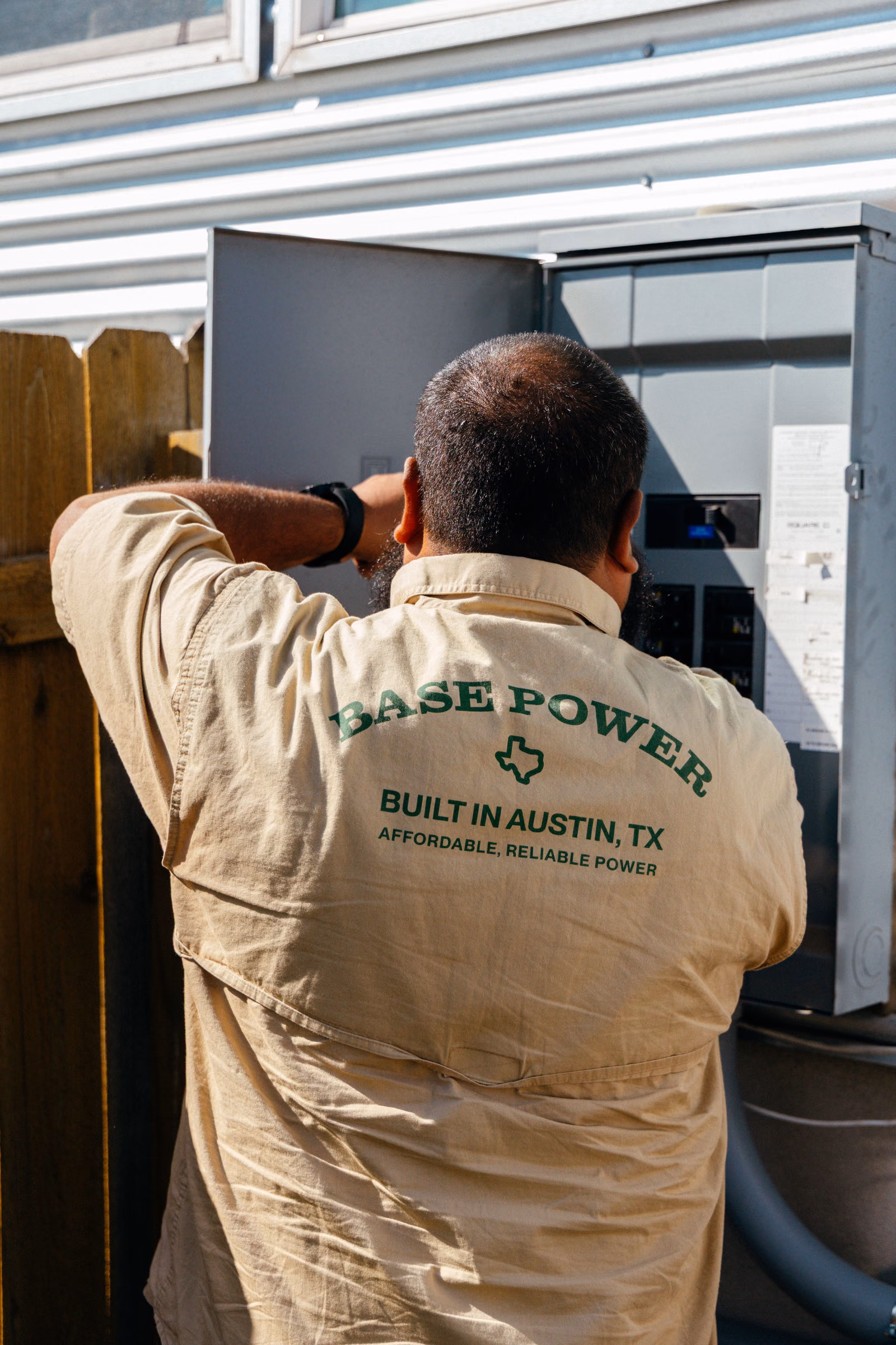 A Base electrician in uniform on site