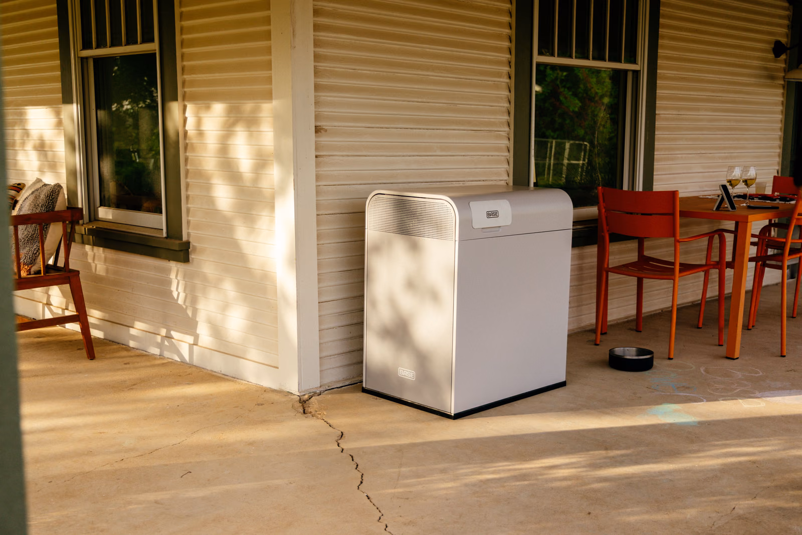 A Base Power battery on a home's porch